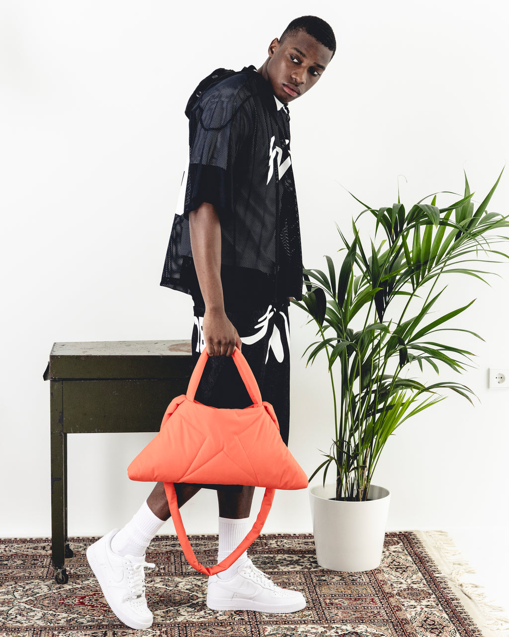 ORANGE TRIANGLE PUFF BAG