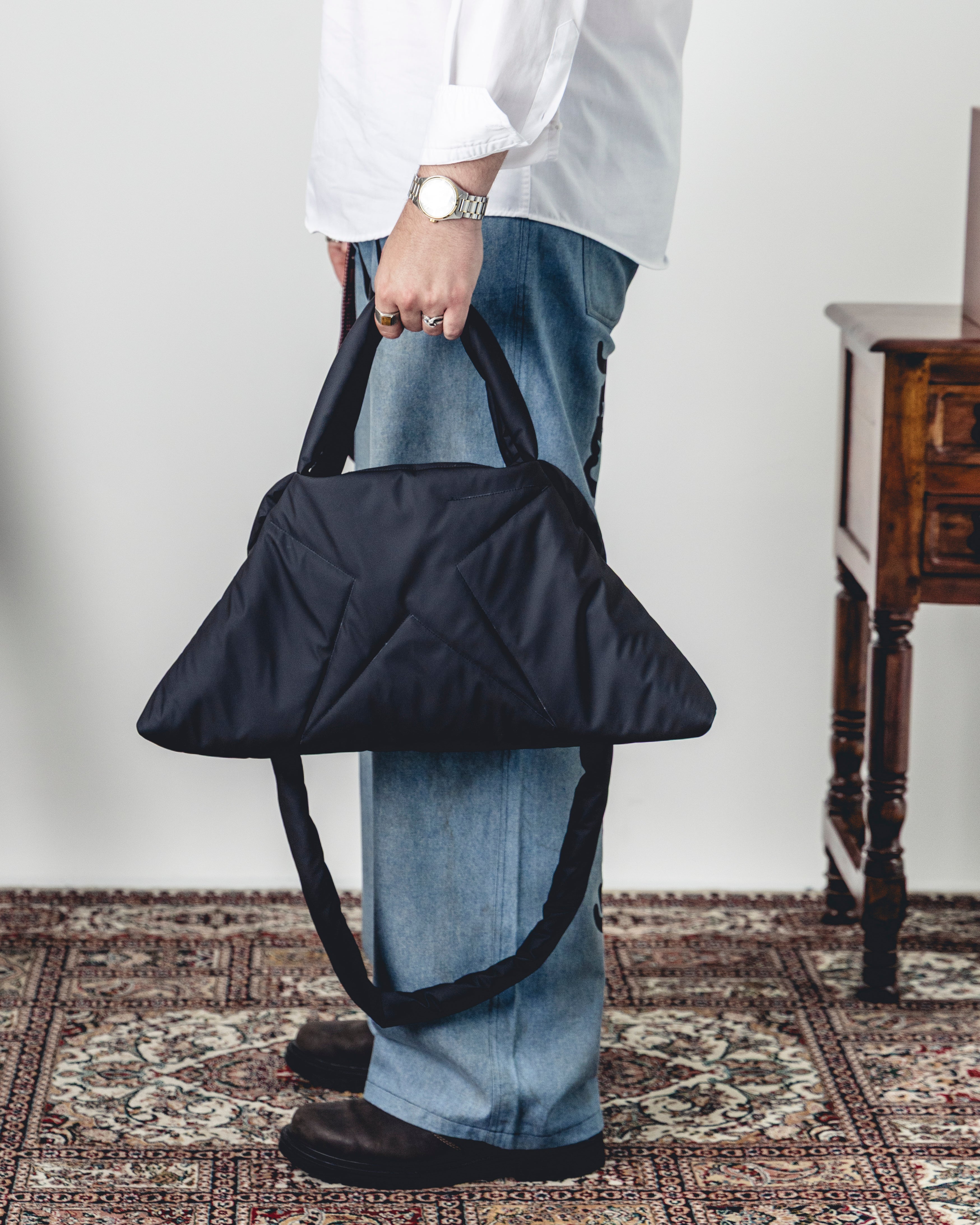 BLACK TRIANGLE PUFF BAG